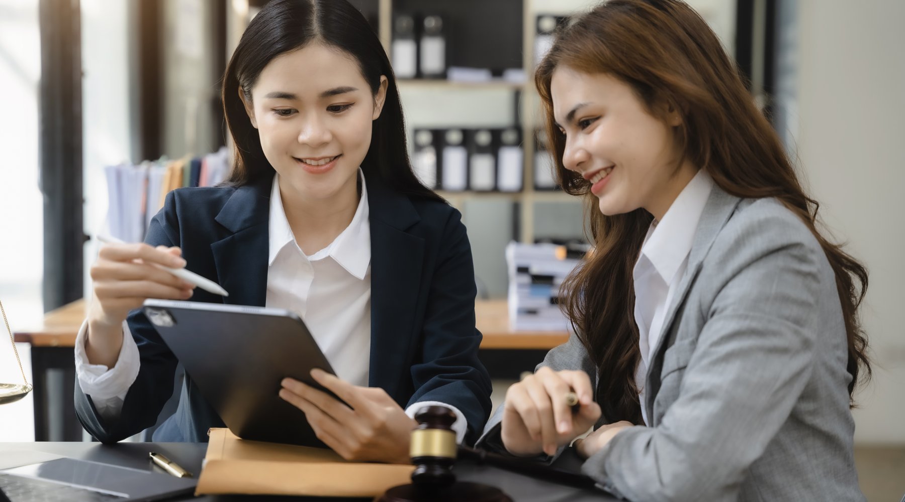 Lawyer businessman and two business partners working together in office