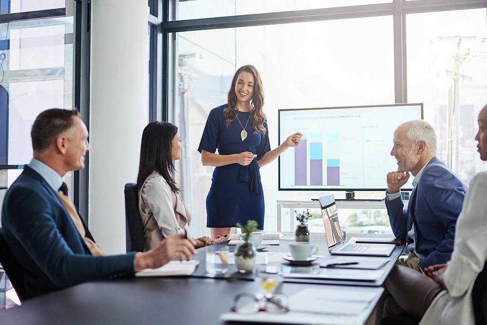 Businesswoman analysis giving a statistic presentation